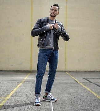 Charcoal Print Sweatshirt Outfits For Men: This combo of a charcoal print sweatshirt and blue jeans is super easy to copy and so comfortable to rock as well! Why not take a more casual approach with footwear and complete this outfit with multi colored athletic shoes?