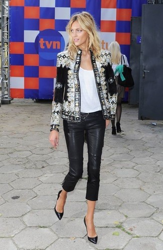 Black Embellished Biker Jacket Outfits For Women: If you're searching for a relaxed yet chic outfit, pair a black embellished biker jacket with black leather skinny pants. Why not complete this look with a pair of black leather pumps for an extra dose of chic?