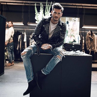 Black Studded Leather Biker Jacket Outfits For Men: For a look that's pared-down but can be manipulated in a myriad of different ways, consider wearing a black studded leather biker jacket and blue ripped jeans. Get a little creative in the shoe department and lift up this look by slipping into a pair of black suede chelsea boots.