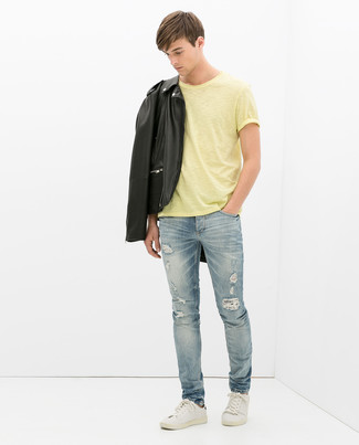 Mustard Crew-neck T-shirt Outfits For Men: A mustard crew-neck t-shirt and light blue ripped jeans married together are a smart match. If you want to immediately amp up this ensemble with shoes, why not complement your ensemble with a pair of white leather low top sneakers?