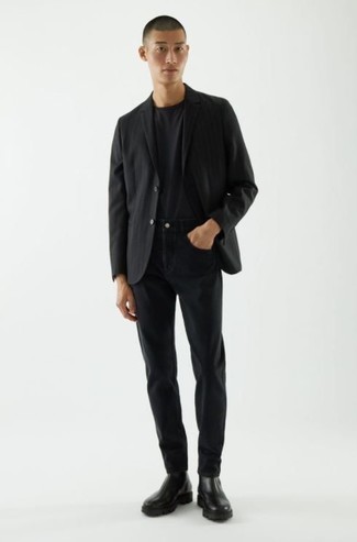 Black Jeans Outfits For Men: Pair a black blazer with black jeans to assemble an effortlessly neat and put together ensemble. A pair of black leather chelsea boots immediately elevates the look.