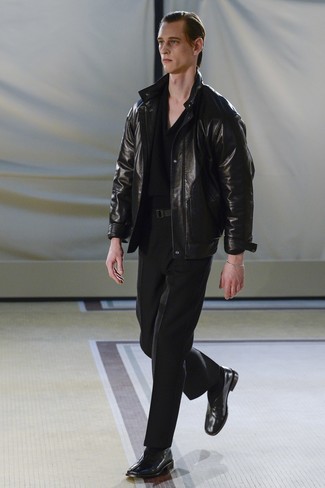 A black leather bomber jacket looks especially polished when worn with black dress pants for a look worthy of a perfect gentleman. Black leather chelsea boots are a great option to complement this outfit.