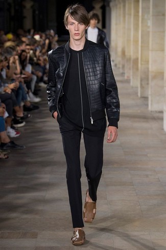 Black Leather Bomber Jacket Outfits For Men: Make ladies swoon in a black leather bomber jacket and black dress pants. Complete this look with brown leather sandals to inject a touch of stylish effortlessness into your outfit.