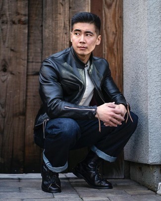 Black Leather Bomber Jacket Outfits For Men: You'll be amazed at how easy it is for any gent to get dressed this way. Just a black leather bomber jacket and navy jeans. And if you wish to immediately up the ante of this getup with one single item, add black leather casual boots to the mix.
