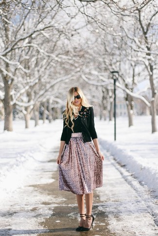 Consider teaming a black embellished cardigan with a pink pleated sequin midi skirt for a day-to-day look that's full of charm and personality. Hesitant about how to finish off? Complement this getup with a pair of black leather pumps to bump up the wow factor.