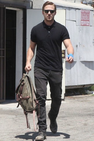 Ryan Gosling wearing Olive Canvas Backpack, Black Leather Casual Boots, Black Jeans, Black Polo