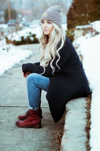 Burgundy Leather Lace-up Flat Boots Outfits For Women: The versatility of a black coat and blue skinny jeans ensures you'll always have them on heavy rotation in your closet. To give this look a more laid-back aesthetic, why not add burgundy leather lace-up flat boots to your ensemble?