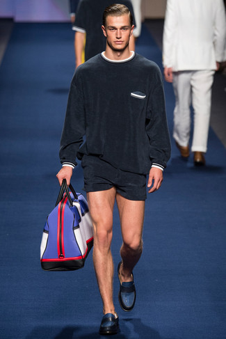 Black Shorts Outfits For Men: Consider teaming a black velvet crew-neck sweater with black shorts for a cool and casual and fashionable ensemble. Let your sartorial prowess truly shine by finishing this look with a pair of navy leather slip-on sneakers.