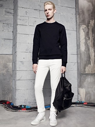 White and Black Leather High Top Sneakers Outfits For Men: This pairing of a black crew-neck sweater and white chinos combines comfort and confidence and helps keep it clean yet current. Complete your getup with white and black leather high top sneakers to inject a touch of stylish nonchalance into your outfit.