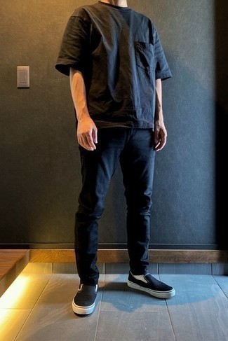 Black Canvas Slip-on Sneakers Outfits For Men: Fashionable and practical, this off-duty pairing of a black crew-neck t-shirt and black jeans will provide you with amazing styling opportunities. And if you want to instantly elevate this ensemble with one single item, add a pair of black canvas slip-on sneakers to the mix.