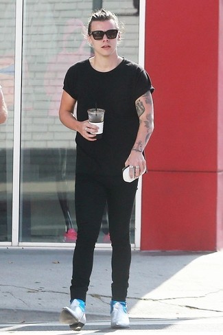 Harry Styles wearing Black Crew-neck T-shirt, Black Skinny Jeans, Grey Leather Chelsea Boots, Black Sunglasses