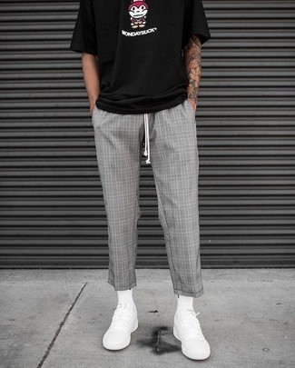 Black Print Crew-neck T-shirt with Grey Plaid Pants Outfits For Men: For a casual look, dress in a black print crew-neck t-shirt and grey plaid pants — these two pieces go well together. Let's make a bit more effort with shoes and introduce white canvas low top sneakers to the mix.