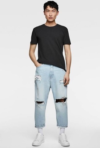 Light Blue Jeans with Black Crew-neck T-shirt Hot Weather Outfits For Men: Consider pairing a black crew-neck t-shirt with light blue jeans, if you want to dress for comfort but also want to look dapper. The whole outfit comes together when you complete your getup with a pair of white leather low top sneakers.
