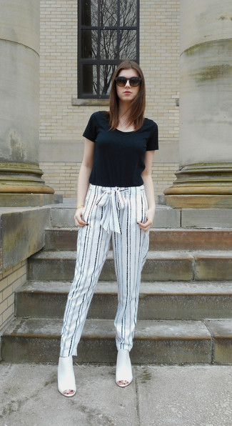Women's Black Crew-neck T-shirt, White and Black Vertical Striped Pajama Pants, White Leather Heeled Sandals, Dark Brown Sunglasses