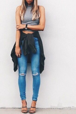 Blue Ripped Jeans Outfits For Women: This combination of a black dress shirt and blue ripped jeans is a safe and very fashionable bet. Complement this getup with a pair of black leather heeled sandals to immediately bump up the glam factor of any look.