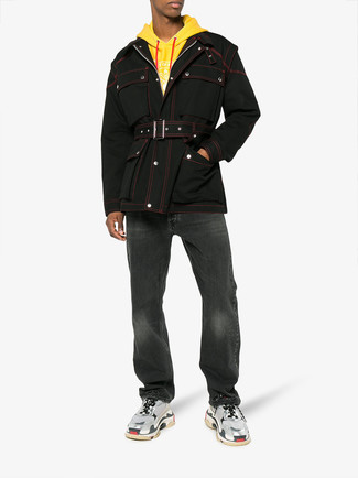Men's Black Field Jacket, Yellow Hoodie, Black Jeans, Grey Athletic Shoes