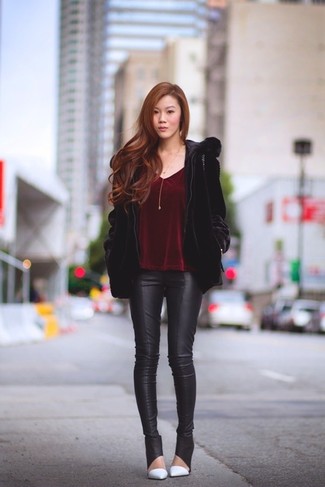 Black Leather Skinny Pants Outfits: Go classic and chic in a black fur jacket and black leather skinny pants. Complete this ensemble with a pair of white leather pumps and off you go looking stunning.