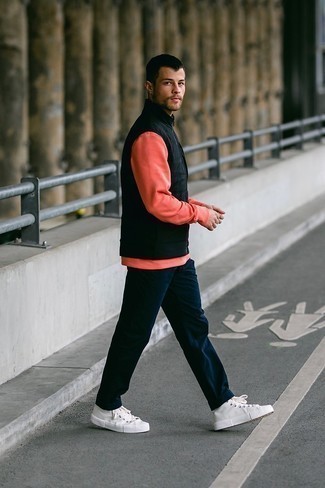 Hot Pink Long Sleeve T-Shirt Outfits For Men: We give a huge thumbs up to this casual combo of a hot pink long sleeve t-shirt and navy chinos! If you want to immediately dress down your ensemble with one single item, introduce white canvas high top sneakers to the equation.