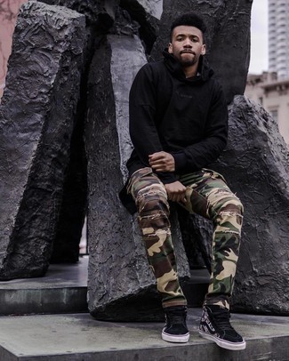 Black Suede High Top Sneakers Outfits For Men: For a laid-back ensemble, wear a black hoodie with olive camouflage cargo pants — these two pieces work nicely together. A pair of black suede high top sneakers is the glue that will bring your ensemble together.