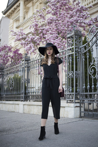 Black Hat Outfits For Women: Flex your expert styling in this casual combination of a black jumpsuit and a black hat. Black embellished suede ankle boots are the most effective way to add an extra dose of class to this outfit.