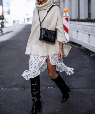 Women's Black Quilted Leather Crossbody Bag, Black Leather Knee High Boots, White and Black Polka Dot Wrap Dress, Beige Knit Oversized Sweater