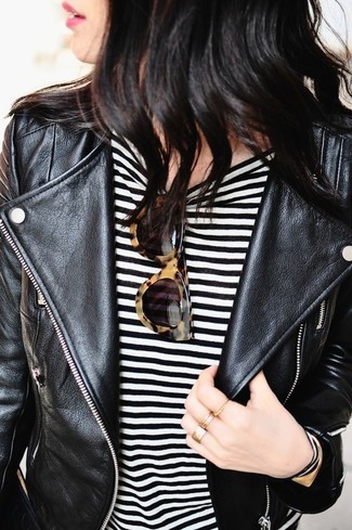 Brown and Gold Sunglasses Outfits For Women: Opt for comfort in a black leather biker jacket and brown and gold sunglasses.