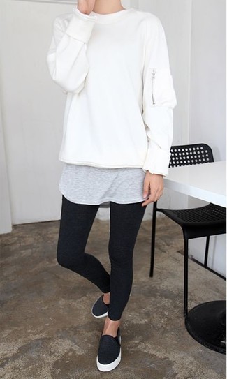 Women's Charcoal Slip-on Sneakers, Black Leggings, Grey Crew-neck T-shirt, White Oversized Sweater