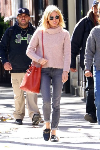 Sienna Miller wearing Red Leather Bucket Bag, Black Leather Loafers, Grey Jeans, Pink Cowl-neck Sweater
