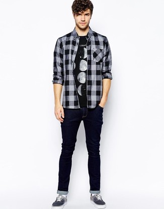 Black and White Check Flannel Long Sleeve Shirt Outfits For Men: Why not go for a black and white check flannel long sleeve shirt and navy jeans? Both items are totally comfortable and will look cool together. Let your expert styling truly shine by finishing this getup with a pair of charcoal plimsolls.