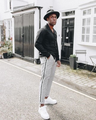 Charcoal Wool Hat Outfits For Men: A black long sleeve shirt and a charcoal wool hat are worth being on your list of veritable casual must-haves. Go ahead and add a pair of white canvas low top sneakers to the mix for an element of refinement.