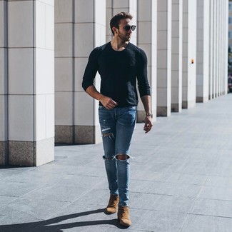 Black Long Sleeve T-Shirt with Brown Suede Chelsea Boots Outfits For Men: If you gravitate towards contemporary style, why not opt for this combination of a black long sleeve t-shirt and light blue ripped skinny jeans? A pair of brown suede chelsea boots effortlessly turns up the wow factor of any outfit.