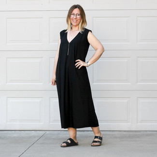 Black Maxi Dress Outfits: Chic yet practical, this look combines a black maxi dress. Dial up your whole getup by slipping into a pair of black leather flat sandals.