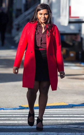 Mindy Kaling wearing Black Suede Pumps, Black Mini Skirt, Burgundy Dress Shirt, Red Coat