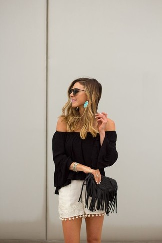White Lace Shorts Outfits For Women In Their 30s: This casual combo of a black off shoulder top and white lace shorts can only be described as strikingly chic.