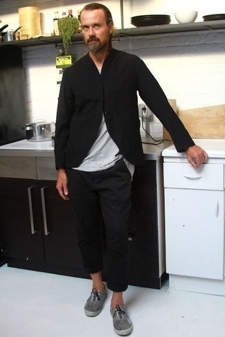 Black Cardigan Outfits For Men: This is definitive proof that a black cardigan and black chinos are amazing when worn together in a casual outfit. Balance out your getup with more relaxed footwear, such as this pair of grey canvas low top sneakers.