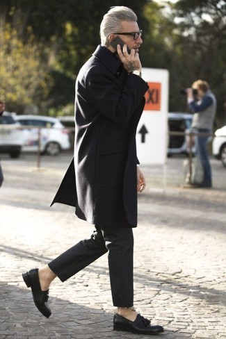 Domenico Gianfrate wearing Black Overcoat, Black Chinos, Black Leather Tassel Loafers