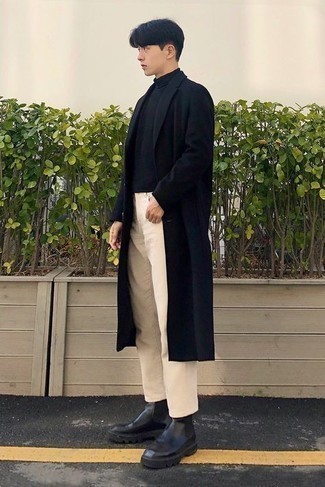 500+ Outfits For Men In Their 20s: For an outfit that's pared-down but can be smartened up or dressed down in plenty of different ways, pair a black overcoat with beige jeans. Add black leather chelsea boots to the mix to instantly ramp up the classy factor of any look. Those who are curious how to pull off smart casual outfits as you progress through your 20s, this getup should answer your question.