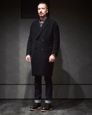 500+ Cold Weather Outfits For Men: You'll be surprised at how extremely easy it is for any man to get dressed this way. Just a black overcoat teamed with black jeans. A pair of black leather casual boots is a never-failing footwear style here that's also full of personality.
