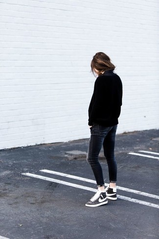 Black High Top Sneakers Outfits For Women: Rock a black oversized sweater with charcoal skinny jeans if you're searching for an outfit idea that speaks casual cool. Introduce a pair of black high top sneakers to the mix and you're all done and looking spectacular.