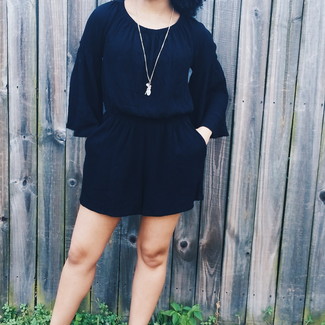 Who said you can't make a stylish statement with a casual getup? Draw the attention in a black playsuit.