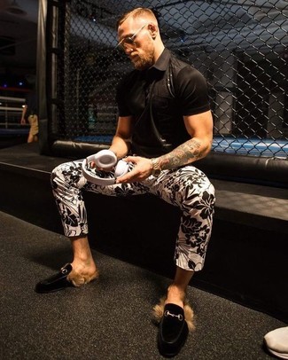 Conor McGregor wearing Black Polo, White and Black Floral Chinos, Black Suede Loafers, Gold Watch