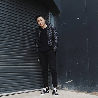 Black Sweatpants Outfits For Men: Here, the cool and relaxed style translates to a black lightweight puffer jacket and black sweatpants. Finishing off with black and white athletic shoes is an effortless way to add a more casual finish to this look.