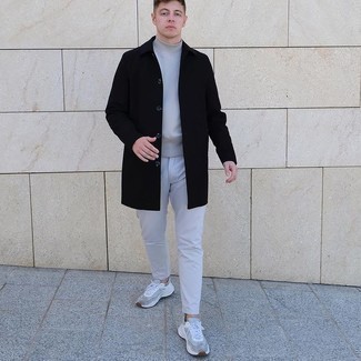 Black Raincoat Outfits For Men: For a casual outfit, try teaming a black raincoat with grey chinos — these two pieces fit pretty good together. To inject a more casual finish into this ensemble, complement this look with a pair of grey athletic shoes.