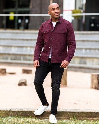 Men's White and Black Leather Low Top Sneakers, Black Ripped Skinny Jeans, White Crew-neck T-shirt, Burgundy Shirt Jacket