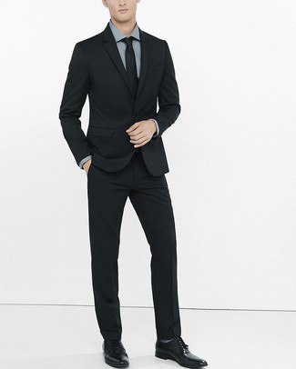 Black Suit Outfits: Go for truly classy style with a black suit and a grey dress shirt. Rev up this getup by slipping into black leather derby shoes.