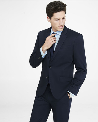 Black Suit Outfits: Definitive proof that a black suit and a light blue dress shirt look awesome if you pair them together in a sophisticated ensemble for today's gentleman.