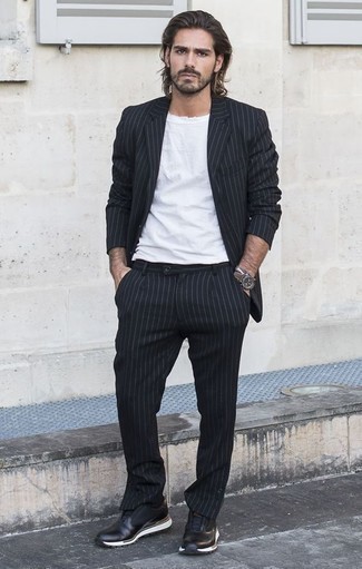 Black and White Vertical Striped Suit Outfits: For a casually smart look, reach for a black and white vertical striped suit and a white crew-neck t-shirt — these items go nicely together. If you wish to immediately dial down this ensemble with one item, add a pair of black athletic shoes to the equation.