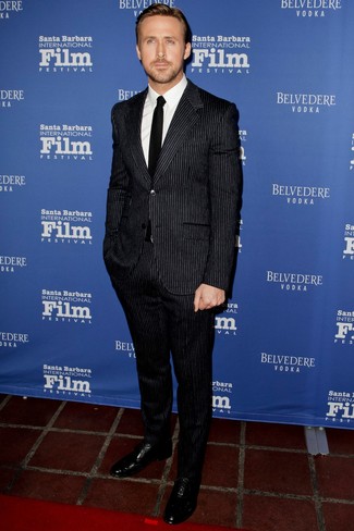 Ryan Gosling wearing Black Vertical Striped Suit, White Dress Shirt, Black Leather Oxford Shoes, Black Tie