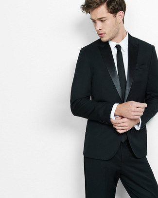 Black Suit Outfits: For a look that's refined and truly GQ-worthy, opt for a black suit and a white dress shirt.