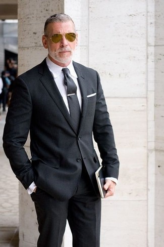 Nick Wooster wearing Black Vertical Striped Suit, White Dress Shirt, Charcoal Tie, White Pocket Square